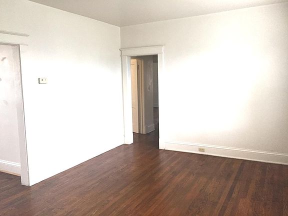 Living Room and doorway to back hall- Beautiful hardwood th