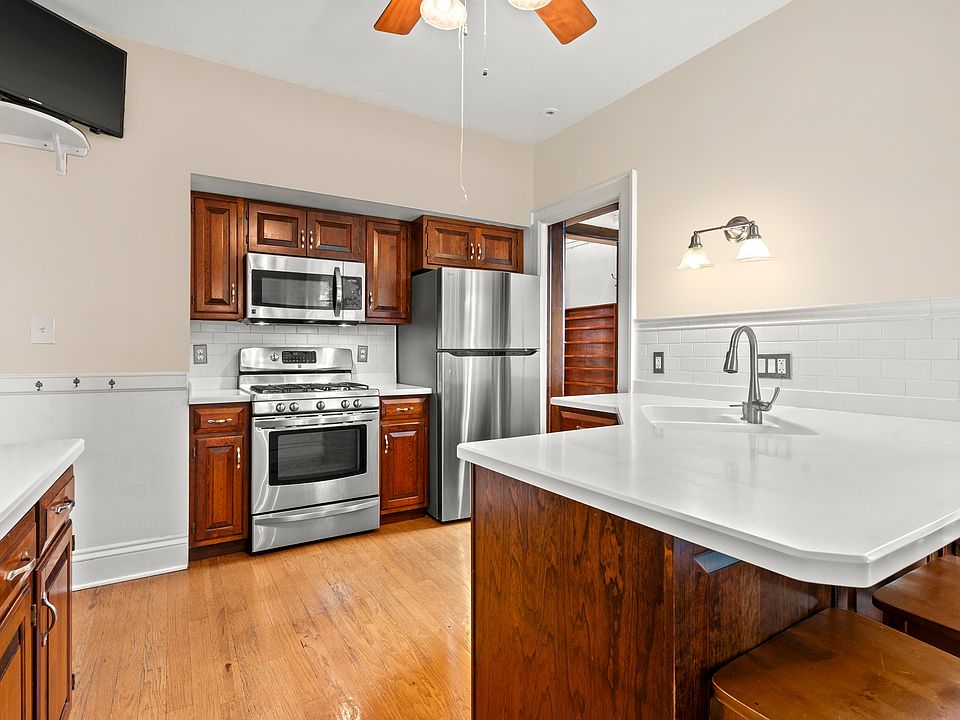 Kitchen with Breakfast Bar and Stainless Appliances