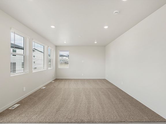 The Pine floorplan interior image taken at a Meritage Homes Community in Tooele, UT.