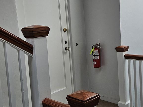 View of #5 doorway from interior common area hallway