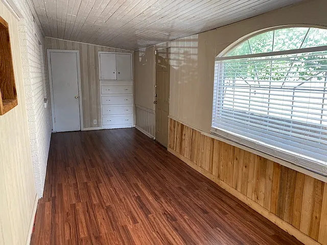 3rd bedroom or can be used as sunroom or study. Has closet, cabinet and drawers for storage