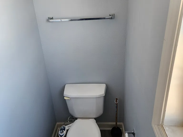 Master bathroom; Separate toilet area; toilet has bidet installed