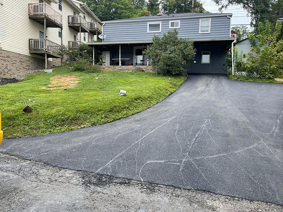 View of the back of the house and driveway.