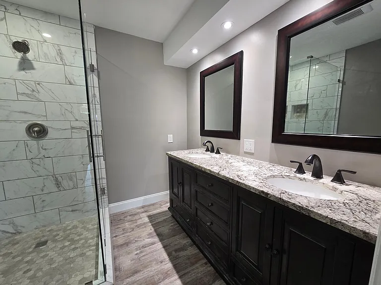 All new master bath with granite vanity and ceramic step-in shower