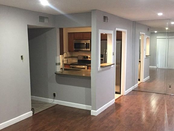 LIVING ROOM AND KITCHEN