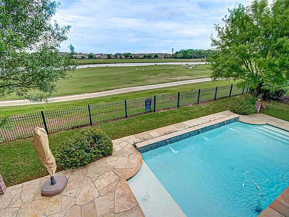 FLagstone surround; ample seating & lounging areas; more mature trees & peaceful views of the Meadowbrook Farms Golf course. Largest lake on the course with views from your backyard & balcony. Not even close to flooding during Harvey!