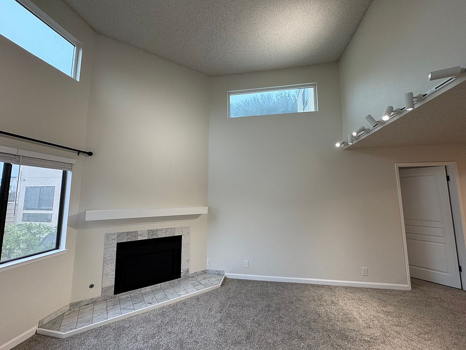 Living area with high ceilings and sky lights