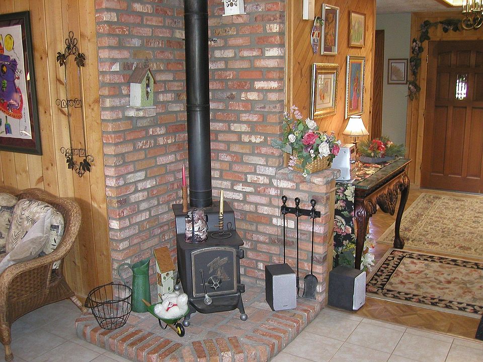 small woodstove by kitchen