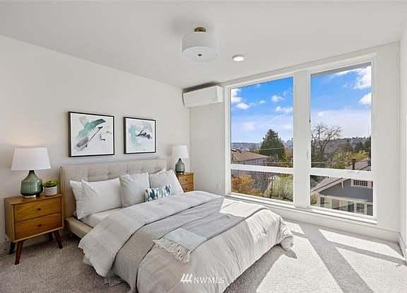 both bedrooms have ceiling to floor windows with good sunlights