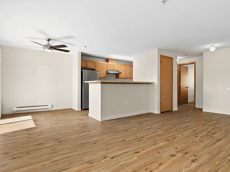 Enjoy bright, open living spaces with modern finishes and wood-style flooring. Enjoy bright, open living spaces with modern finishes and wood-style flooring.