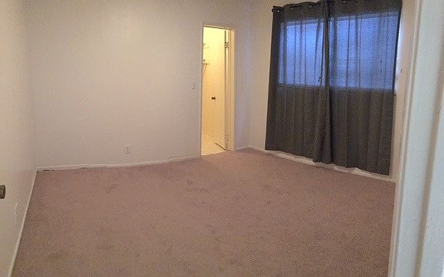 Bedroom with walk in closet