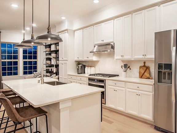 Kitchen with large center in the Shire Model at Valley Forge Greene