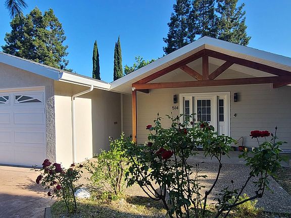 Front, Garage Door & Driveway