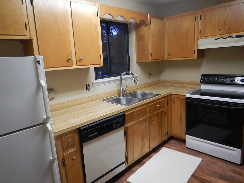 Kitchen with beautiful stained wood cabinets