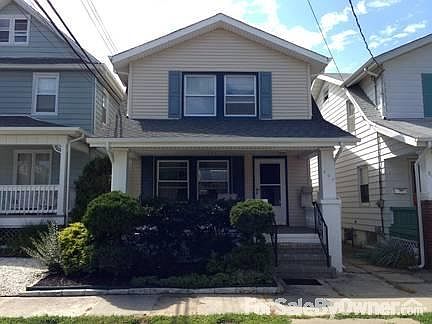 Front of house with covered porch