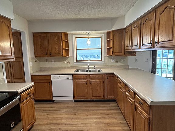 Kitchen is just off the mud/laundry room with nearby garage access.