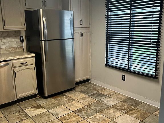 5th image of 322 E 60th Ct