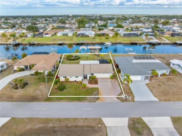 774 SPRING LAKE BOULEVARD NW, PORT CHARLOTTE, FL 33952