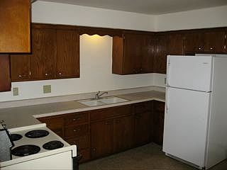 Huge kitchen with lots of counters, dining area and enormous