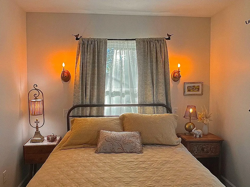 Single bedroom with queen sized-bed. Sheer curtains will be replaced with blackout curtains for optimum sleep. Temperature-controlled by the guest. Bedroom is also fully decorated and cozy.