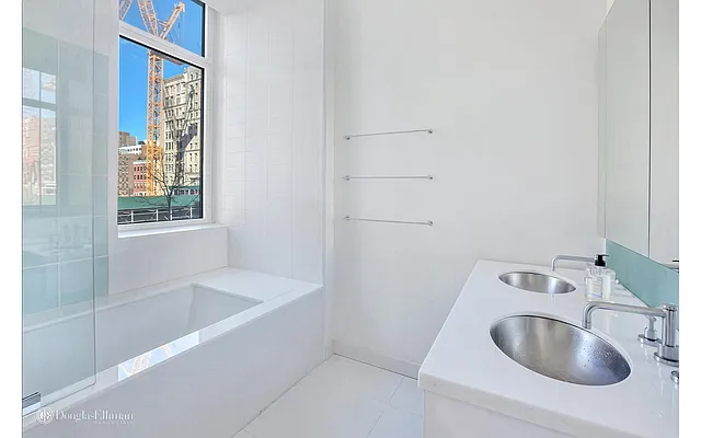 Sold by Douglas Elliman | media 18