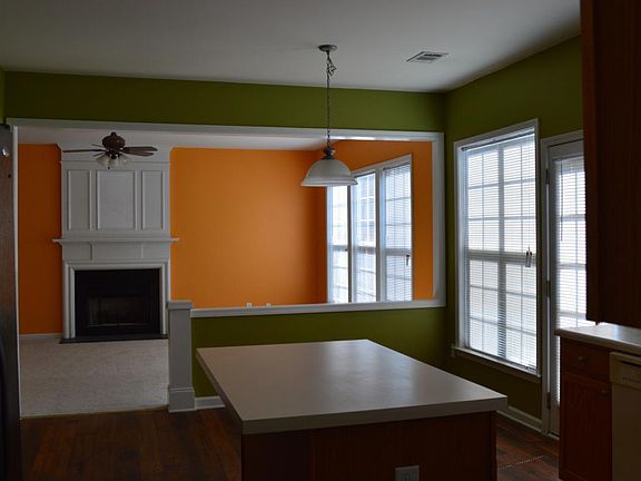 Kitchen island, breakfast area open to family room