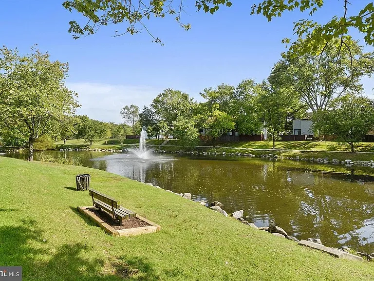 Pond w/ paved trail
