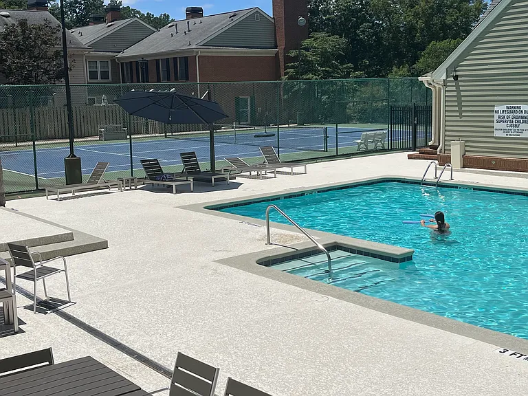 Community pool and tennis court