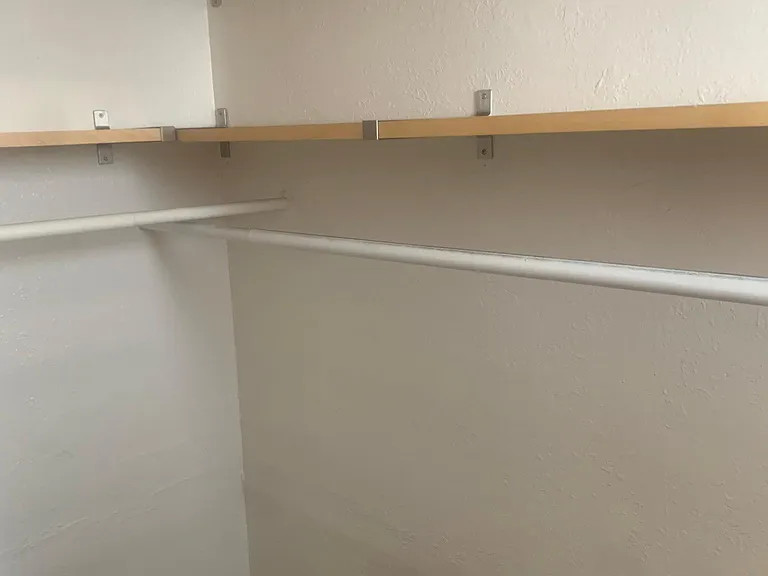 Walk in closet in bedroom
