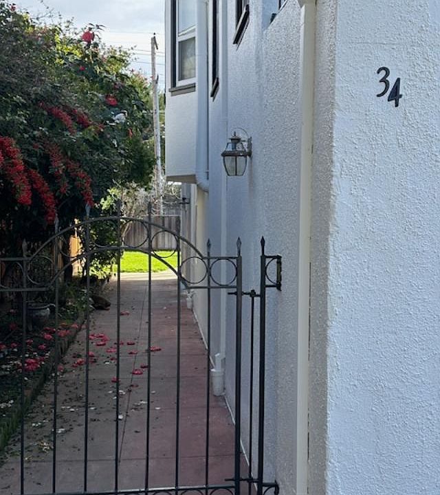 Gate to 34-14th Ave. 
Lower unit