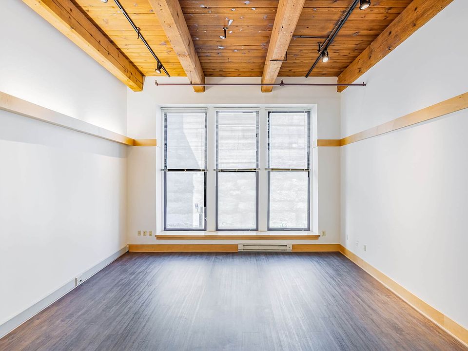 Exposed timber and huge ceilings