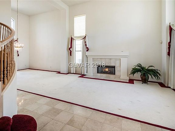 Formal Living Room w/Gas Fireplace,  and Formal Dining Room