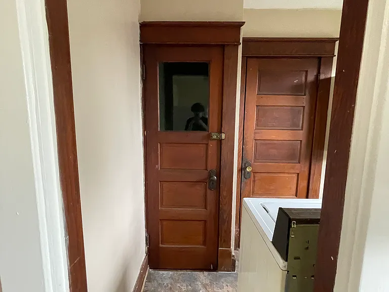 Fire exit to the left
Walk in pantry to the left