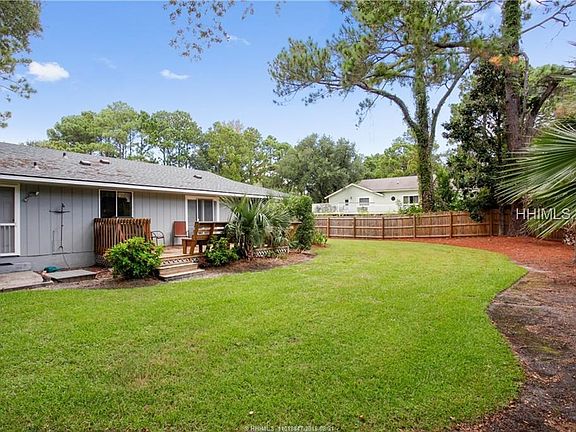 Large fenced backyard with room for a pool.