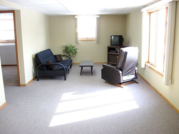 Large family room with fresh paint & daylight windows! Plus space for Rec room
