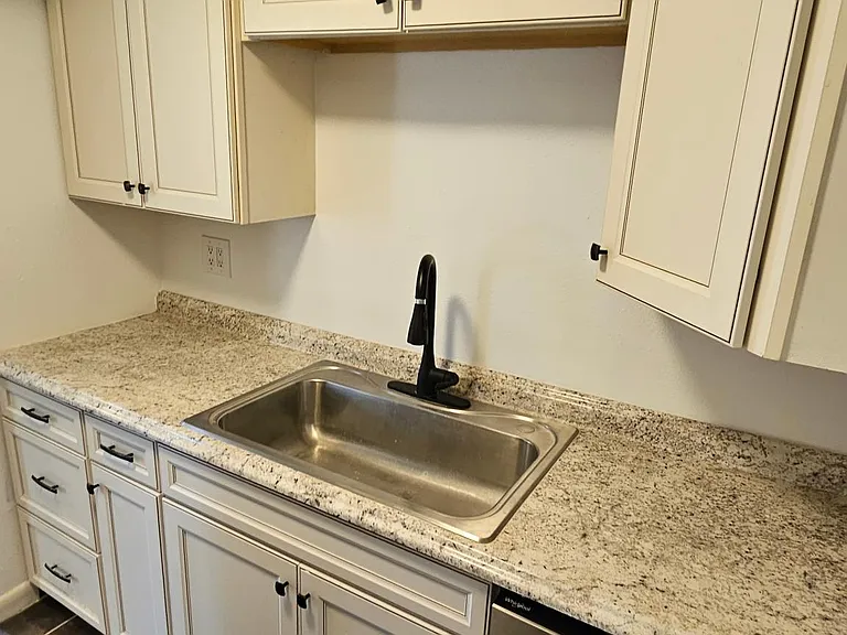 New Dishwasher and wide sink and Cabinets
