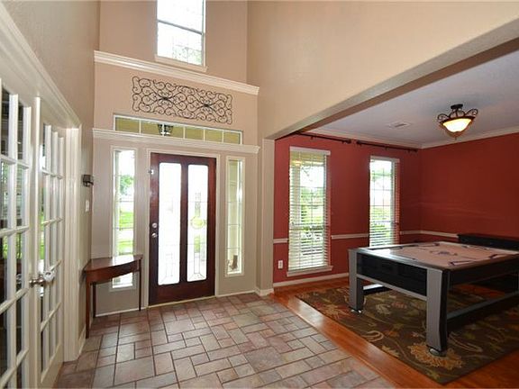 Once you walk in through the front door, you will notice the Formal Dining Room to your left and the