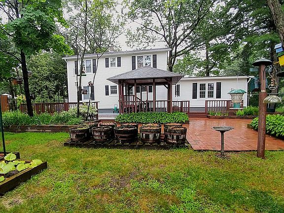 Backyard gardens, brick patio