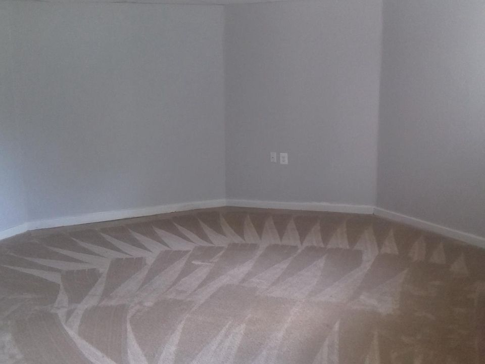 large living room with hardwood dining area