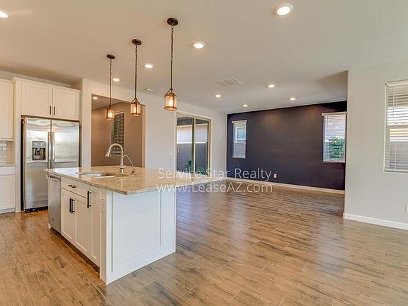 4th image of 9923 E Thornbush Ave