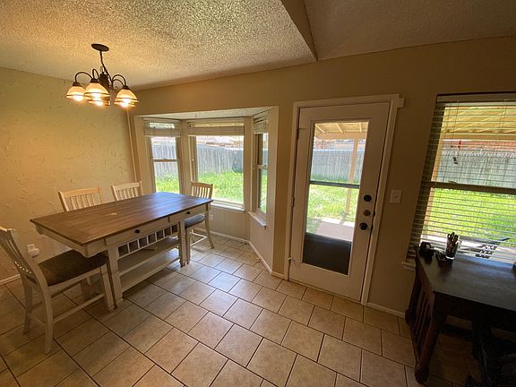 Looking from living room into breakfast/dining area.