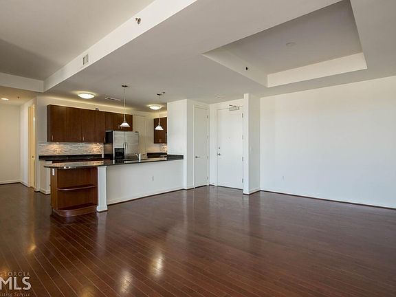4th image of 711 Cosmopolitan Dr NE #613