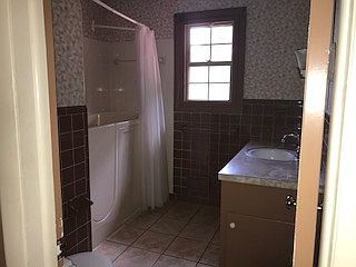 Bath with walk-in tub