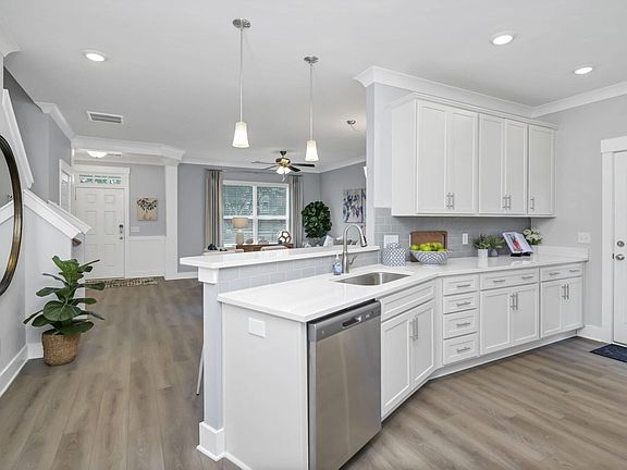 These photos are representative of this floor plan, but all options may not be available in every co