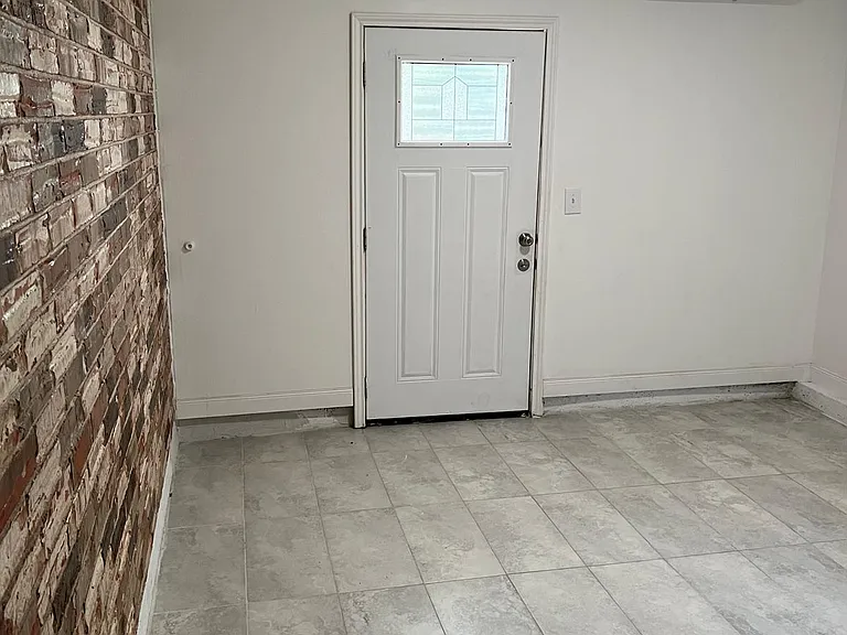 Bedroom, door leads to back yard