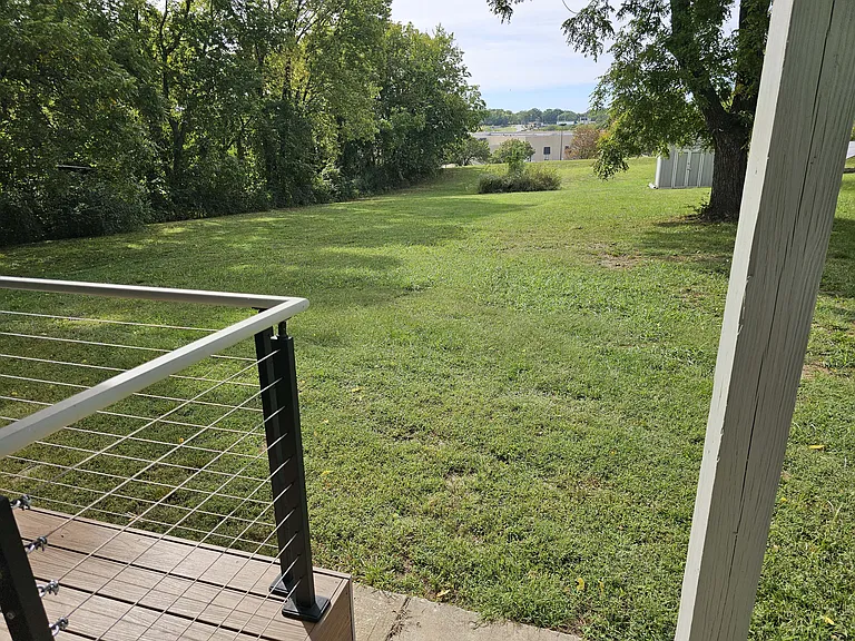 Back lot facing W. from Back Door Porch