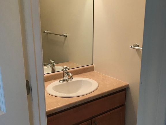 1/2 bath off kitchen, living area