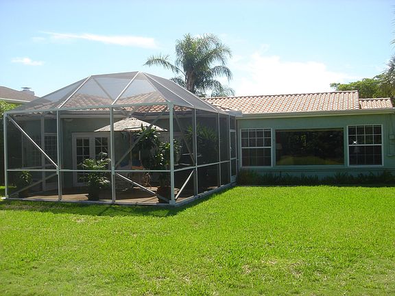 Large fenced in yard and screened patio 