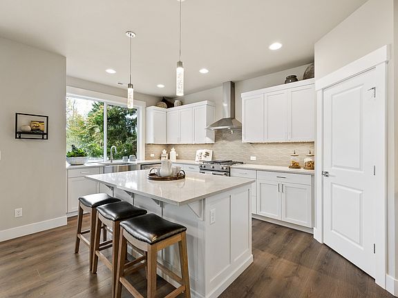 Photos from previous 2697 model by RM Homes - finishes and colors will vary