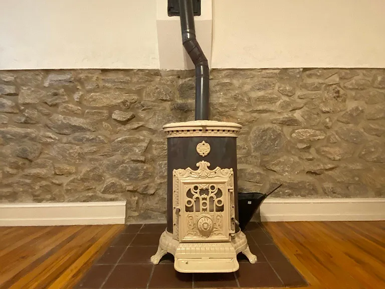 FRANKLIN STOVE, WORKING, IN LIVING ROOM